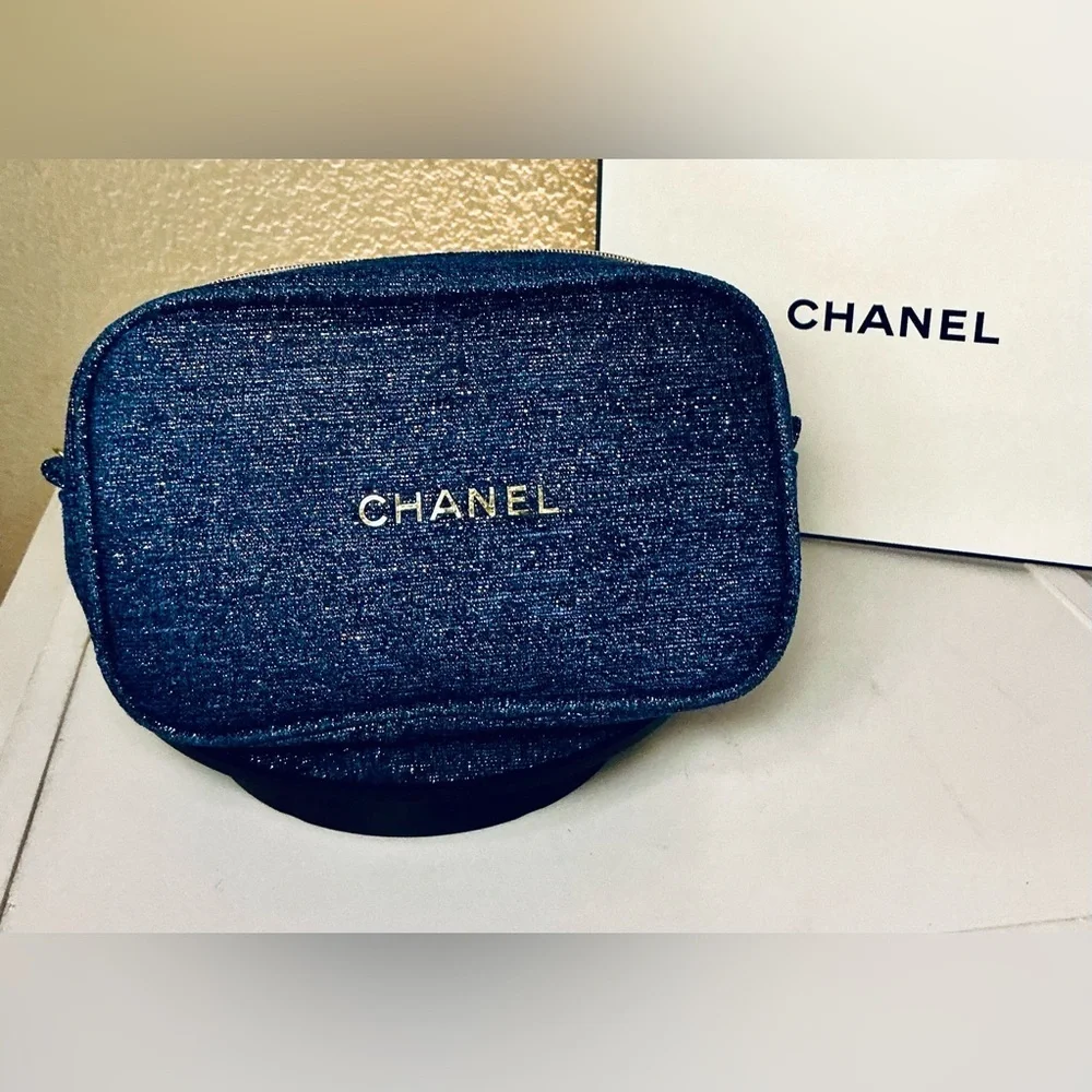 CHANEL Denim Blue Sparkle Pouch with Gold Accents